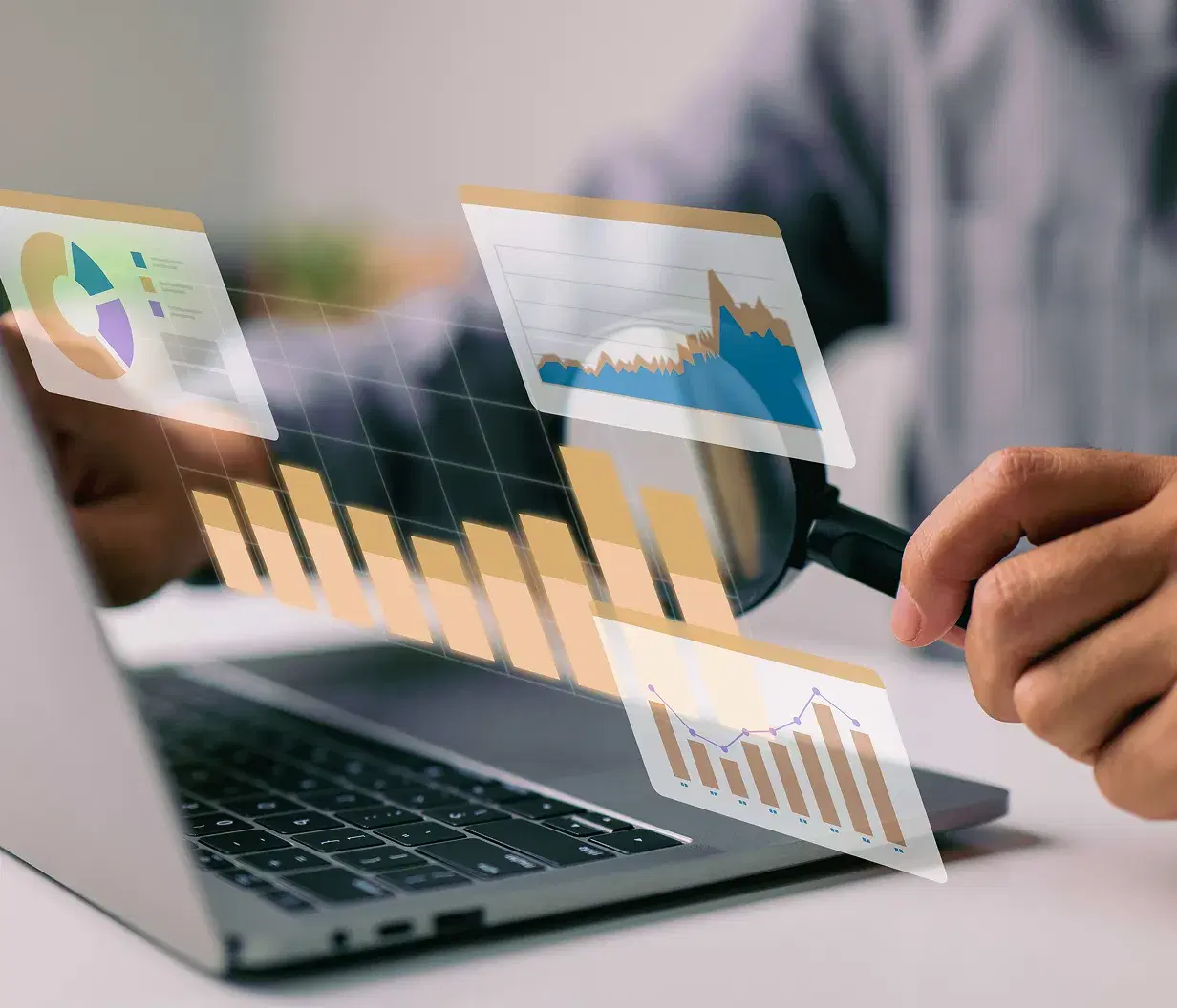 Analyst examining charts and reports with a magnifying glass